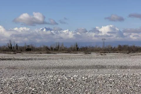 A desolate, barren landscape with a few trees scattered throughout Foto stock