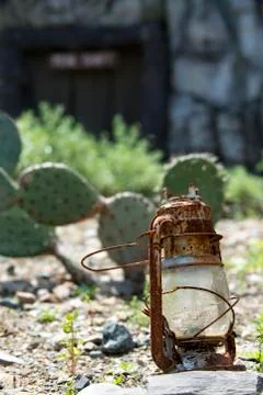 Desolate desert lantern and mine Stock Photos