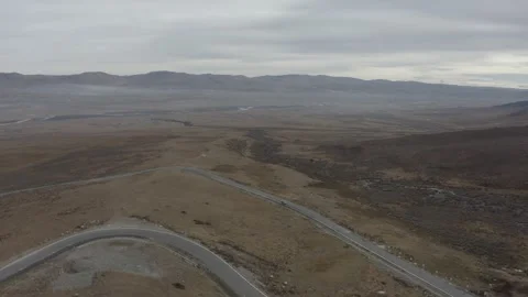 The desolate grassland highway in winter Video stock 337985329