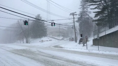Desolate Highway Intersection During Snowstorm Stock Footage 85282470