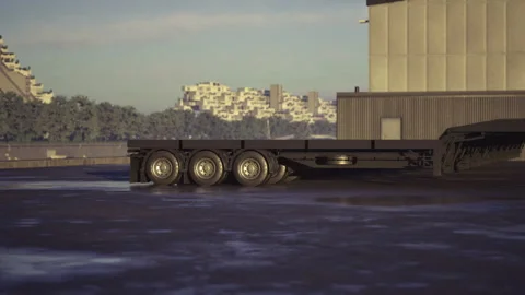 Desolate industrial yard featuring idle flatbed wheels and somber lighting Stock Footage 340664431