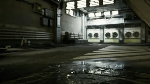 Desolate laundry room bathed in stark beams and quiet tension 스톡 동영상 335595135