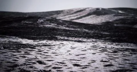 Desolate lunar landscape captures the stark beauty of otherworldly terrain Ilustração Stock