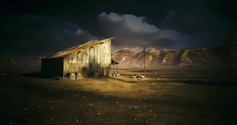 Desolate mountain station, Isolated outpost under moonlit mountain slopes 動画素材 333561390