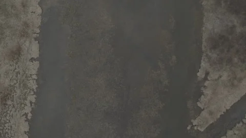 Desolate River Low Flow Fly Over Stockbeeldmateriaal 248728344