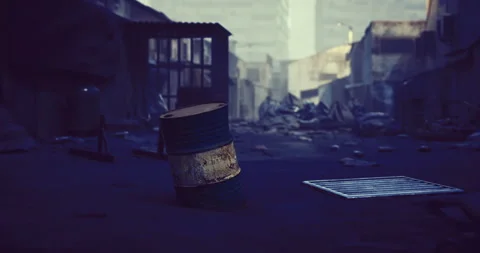 Desolate urban landscape with a rusty barrel and debris at dusk Stock Footage 341729438