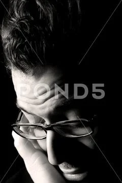 Despaired man introspecting. Stock Photos