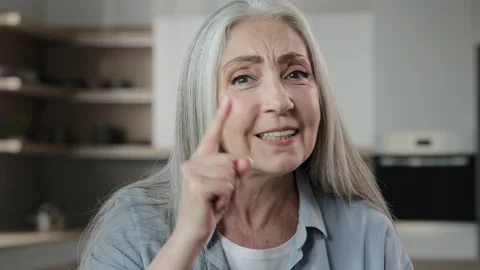 Desperate annoyed old gray-haired woman caucasian elderly lady expressing Stock Footage 203590025