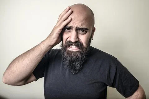 Desperate bearded man isolated Stock Photos