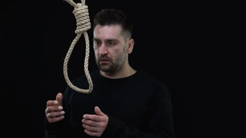 Desperate crying male putting loop neck, Jesus preventing suicide commitment Stock Footage 107741074