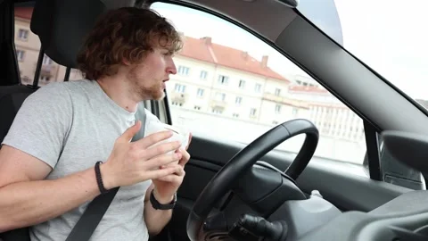 Desperate driver seeks a toilet with no public restrooms along the road Stock Footage 343720455