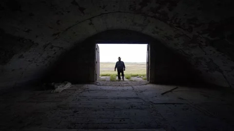 Desperate farmer near an empty barn. World economic crisis.Empty stable, storage Stock Footage 133002122