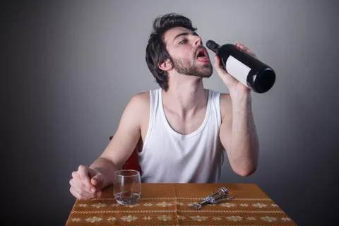 Desperate for the last drop of wine Stock Photos