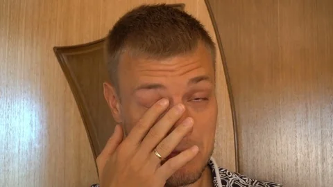 A desperate man cries: crying for love or pain: sadness, loneliness Stock-Footage 79192336