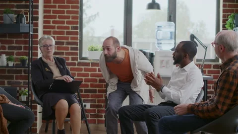 Desperate man having mental breakdown becuase of depression at aa group meeting Stock Footage 165157507