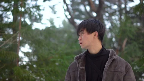 Desperate Man Lost in Wilderness - Winter Forest Stock Footage 101002902