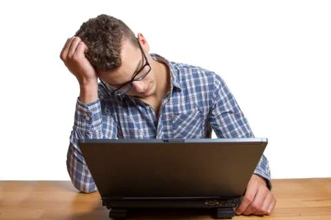 Desperate man sitting at the computer Stock Photos
