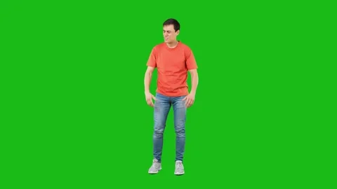 Desperate man in studio against chroma key Stock Footage 188184494