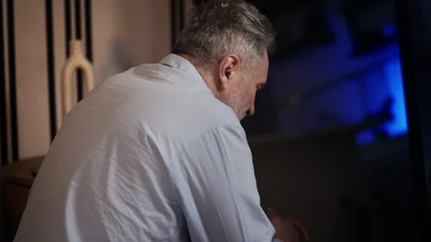 Desperate middle-aged man thinking about his illness and personal problems Video stock 326949539