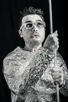 Desperate spaceman with rope Stock Photos