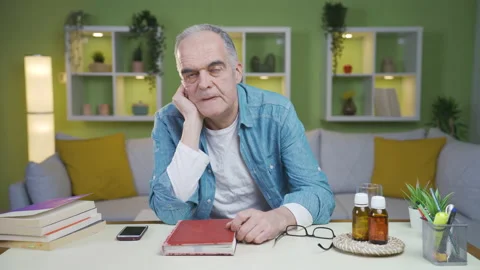 Desperate thoughtful old man with his hand on his cheek. Stock Footage 237795190