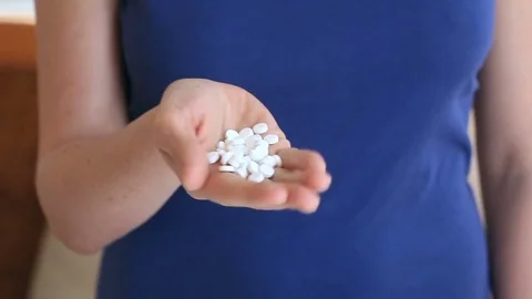 Desperate woman attempts to commit suicide with pills. When provoking suicide Video stock 75852287