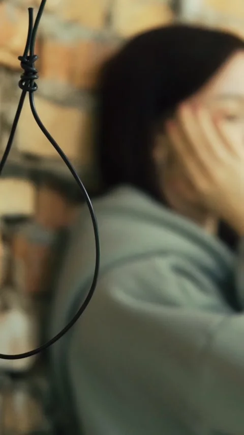 A desperate young girl prepares to commit suicide by hanging. Suicide. 스톡 동영상 313171451