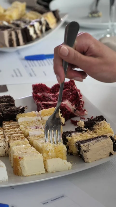 Dessert and cake tasting. Eating pastries. Stock Footage 336818276