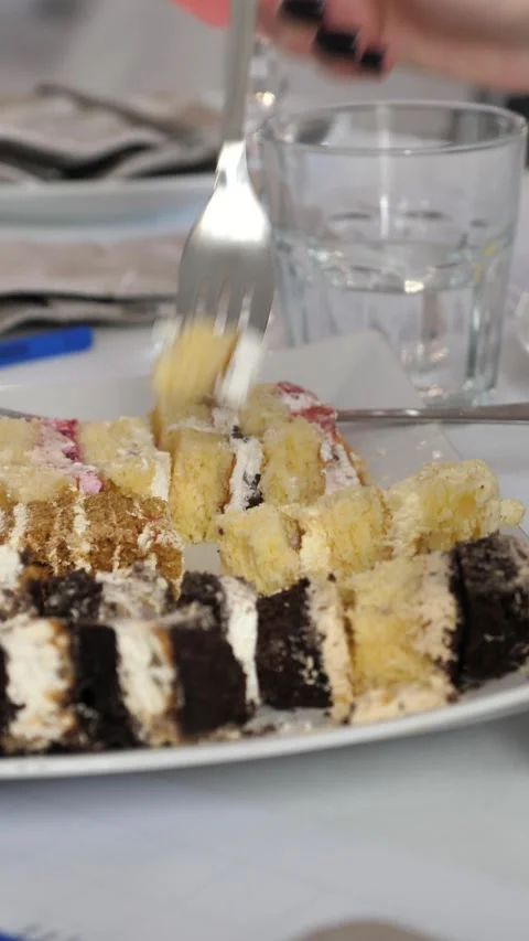 Dessert and cake tasting. Eating pastries. Stock Footage 337579816