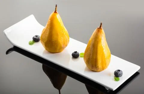 Dessert, baked pear Stock Photos