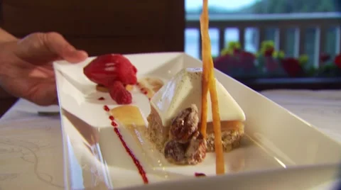 Dessert being served on Table Stock Footage 54592259