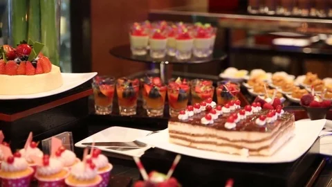 Dessert buffet pastry display Stock Footage 77583461