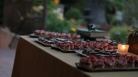 Dessert buffet table at lavish party A Stock Footage 109849377