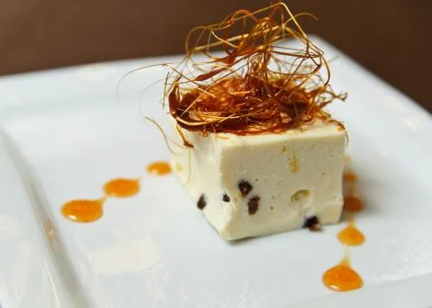 Dessert decorated with caramel threads Stock Photos