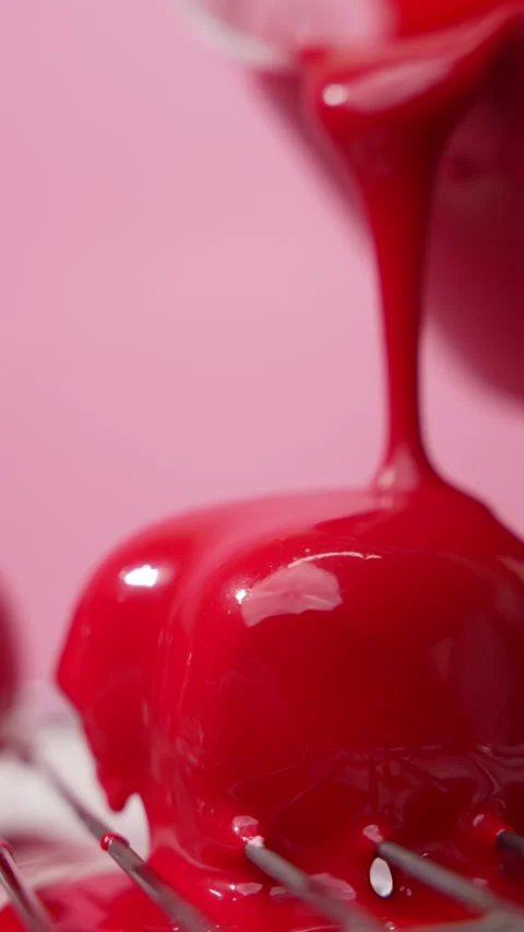 The dessert is filled with red cream Stock Footage 235609129