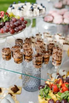 Dessert-filled table setup Stock Photos