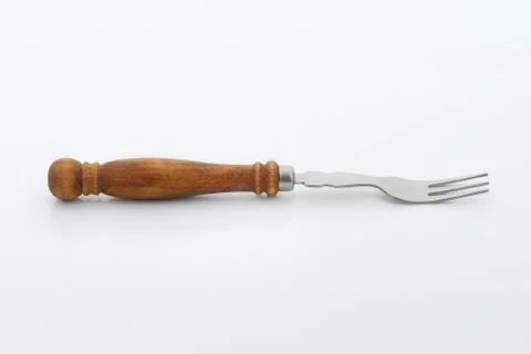 Dessert fork with wooden handle Photos