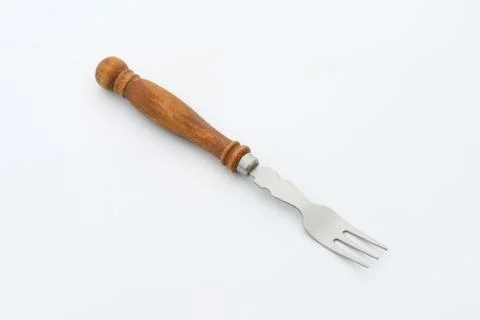 Dessert fork with wooden handle Photos