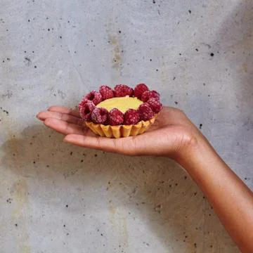 Dessert in a hand Stock Photos