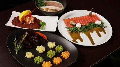Dessert, main course and appetizer on the table Stock-Footage 328185643