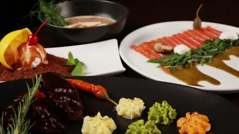 Dessert, main course and appetizer on the table Stock Footage 328188919