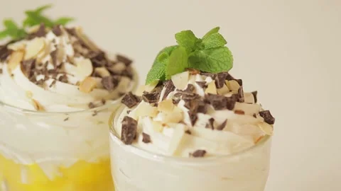 Dessert with mango and cream Stock Footage 239920864