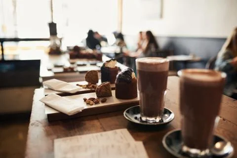 Dessert orders ready for serving on a cafe counter Stock Photos