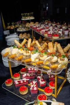 Dessert in a plastic basket on the buffet table Stock Photos