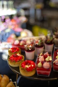 Dessert in a plastic basket on the buffet table Stock Photos