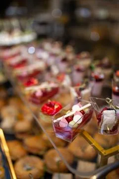 Dessert in a plastic basket on the buffet table Stock Photos