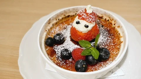 Dessert pudding with santa made my strawberry no pan Stock Footage 100872598