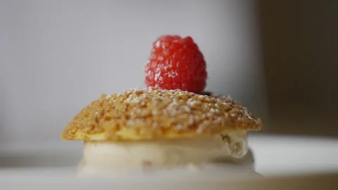 A dessert with a raspberry on top Video stock 301518135