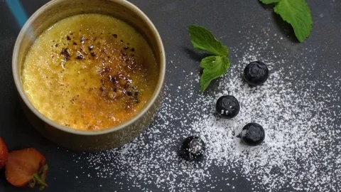 Dessert in a round shape caramelized with a burner. Slow motion Stock-Footage 75237282