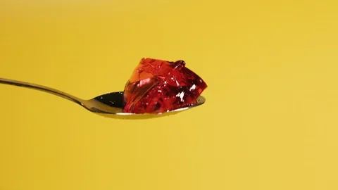 Dessert. Spoon with cherry jelly. Stock Footage 124521054